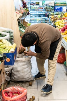 seller selling caucasian shopping people buying food man market groceries vegetable vegan organic