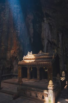 Asian Buddhist temple inside the Huyen Khong Cave in the Marble Mountains in Da Nang in Vietnam in Asia