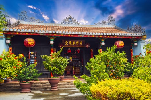 Beautiful Asian Buddhist temple on Vietnamese pagoda in the old town in Hoi An in Vietnam in Asia in summer