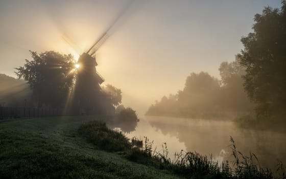 Hengstforder mill close to Bad Zwischenahn on a foggy morning, Lower Saxony, Germany