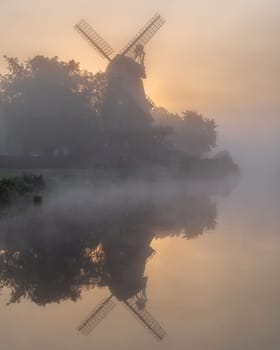 Hengstforder mill close to Bad Zwischenahn on a foggy morning, Lower Saxony, Germany