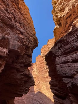 Vertical photo of rock formations in Salta, Quebrada de la Conchas.Used for promotions and advertisements for travel and tourism agencies. Ecological tourism. Exotic landscapes of northern Argentina.