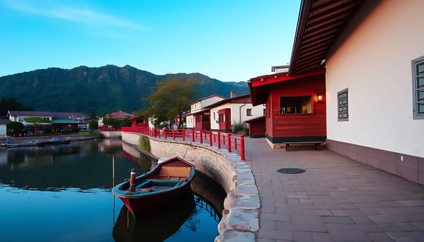 A tranquil scene of a red boat docked on a calm lake in front of a charming village nestled in the foothills of a mountain range. The vibrant colors of the boat and the surrounding houses create a picturesque setting. The image captures the essence of peaceful living and the beauty of nature. Perfect for travel, tourism, or lifestyle projects.