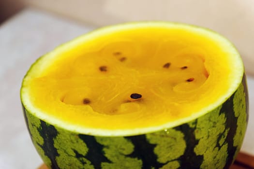 Delicious yellow watermelon sliced open to reveal its vibrant, sweet interior, perfect for summer