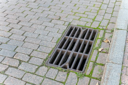 sewage sewer rain water drainage sewerage flood road grate drain storm manhole street