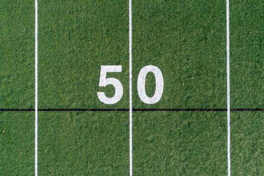 view looking down at the 50 yard line on a football field