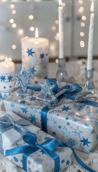 Hanukkah gift set featuring beautifully wrapped presents adorned with blue and silver ribbons. includes artisan candles, dreidels, and menorahs, creating a festive and sophisticated holiday display.