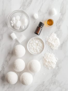 Ingredients for homemade bath bombs on a marble surface, showcasing DIY beauty and self-care.