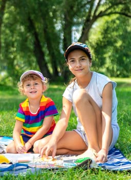 Child girl on a picnic in the park. Selective focus. kid.