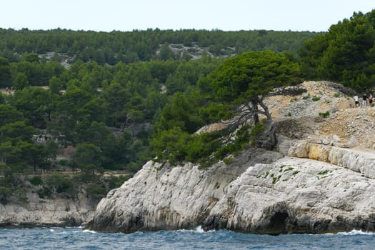 Marseille, France - June 9, 2024 : Calanque of Marseille on the Coast of Provence, Calanques National Park seen from an excursion boat cruising, High quality 4k footage
