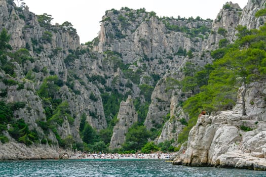 Marseille, France - June 9, 2024 : Calanque of En-Vau on the Coast of Provence, Calanques National Park seen from an excursion boat cruising, High quality 4k footage