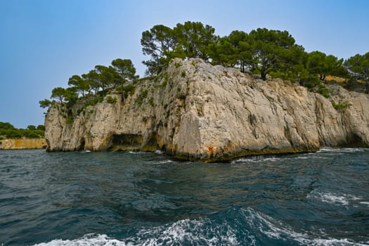 Marseille, France - June 9, 2024 : Calanque of En-Vau on the Coast of Provence, Calanques National Park seen from an excursion boat cruising, High quality 4k footage
