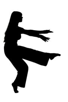 A striking silhouette of a woman gracefully standing on one leg against a pristine white background, showcasing her balance and poise