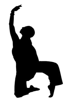 A dark silhouette of a person who is kneeling down with their arms outstretched wide, reaching towards the sky in a graceful pose
