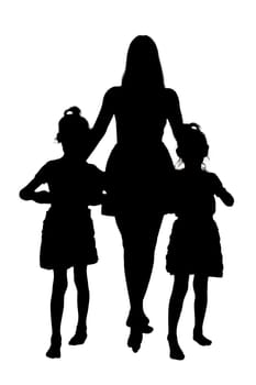 The distinct silhouette of a woman gracefully walking alongside two small girls who appear to be happily enjoying their time together