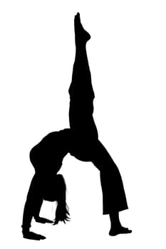 A striking silhouette of a person elegantly performing a handstand against a clean, white background that emphasizes their form