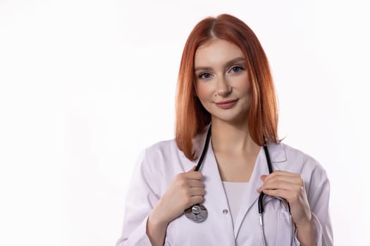 A selfassured female doctor confidently poses with her stethoscope, fully prepared to assist patients in need