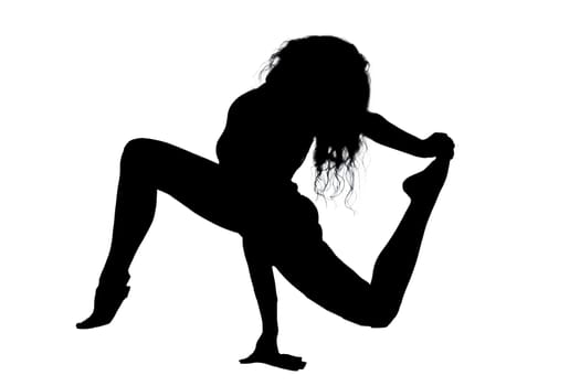 A graceful silhouette of a woman performing an elegant yoga pose against a clean and bright white background that enhances her form