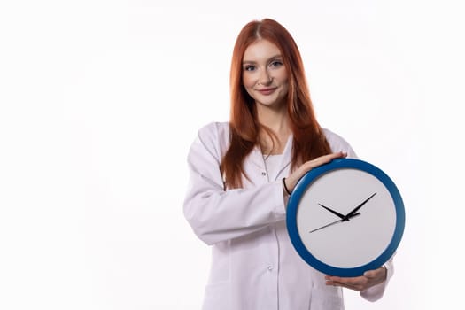 A young woman confidently holds a clock in her hand, symbolizing effective time management and productivity