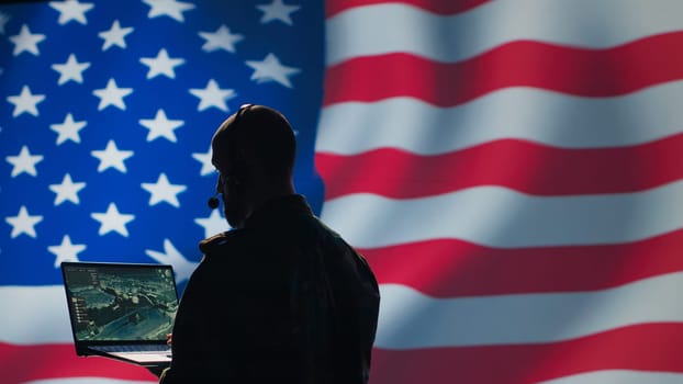 American NATO air defense operator uses radar detecting missile attacks, conducting space surveillance and satellite tracking. United States agent uses military software preventing rockets, camera A