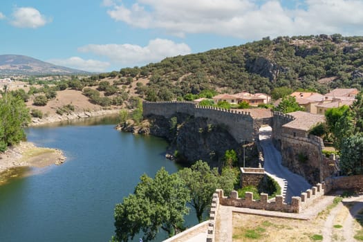 Panoramic view of Buitrago de Lozoya with the river and the walls, Community of Madrid, Spain