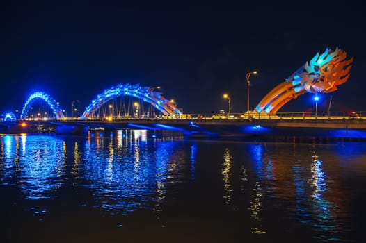 Dragon Bridge over Han River is a famous landmark in city of Da Nang in Vietnam at night