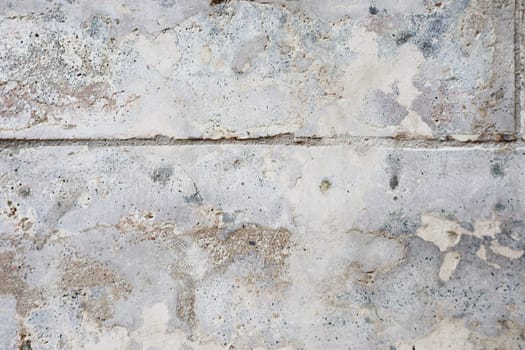 Abstract background from an old concrete wall. Abandoned wall.