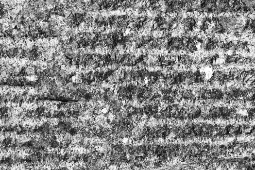 Old walled up antique gray brick wall.