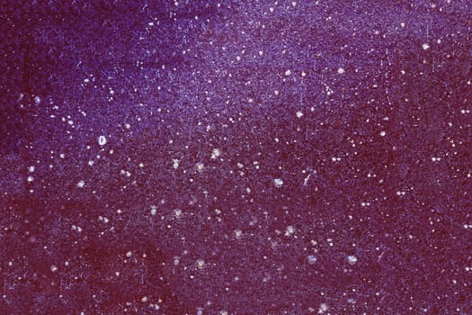 The surface of the stone is painted purple.