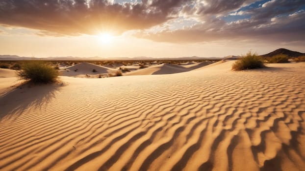 As the sun sets beyond the horizon, golden light washes over the rippled sands of the desert, creating a stunning contrast with the deepening sky filled with clouds.