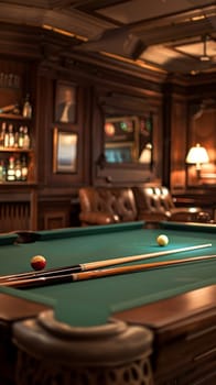 A pool table with a racked set of pool balls sits in a dimly lit room