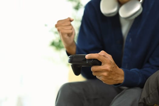 Closeup man playing a game and enjoyment