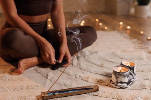 Yoga meditation at home. girl doing aromatherapy and meditation at home, stay calm and be happy. Aromatherapy
