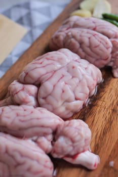 mutton brain on a chopping board .