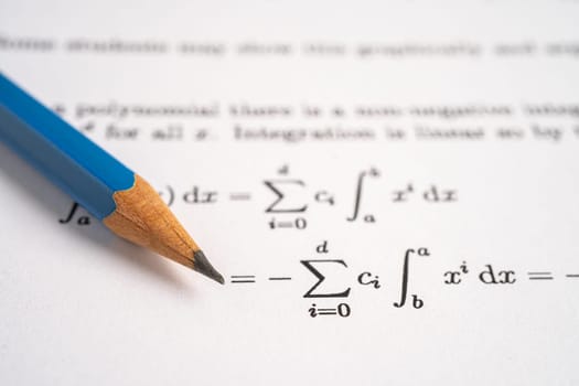 Pencil on mathematic formula exercise test paper in education school.