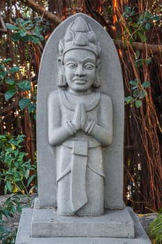 Buddhist statue of the deity in the park at pagoda at the Cham Towers in Nha Trang in Vietnam