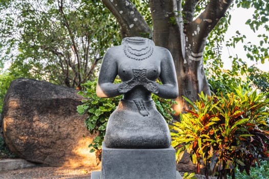 Buddhist statue of a female deity in park at the pagoda in Vietnam