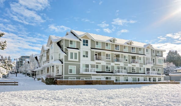 Residential low-rise building on bright winter day in British Columbia.