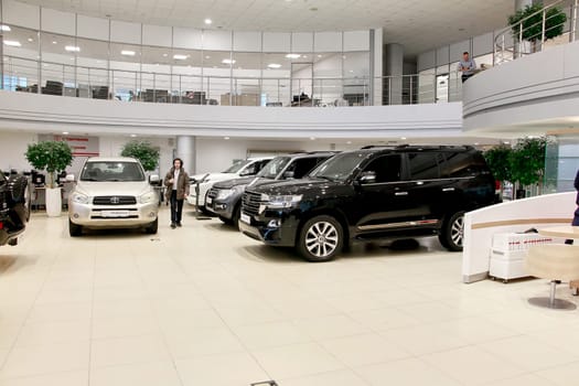 Kazan, Russia - November 25, 2022: Cars in showroom of dealership Toyota in Kazan in Russia