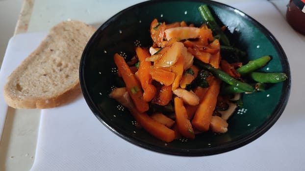 vegetables and fish, healthy food in a green plate. High quality photo