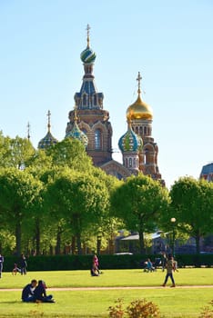 St. Petersburg, Russia - June 04.2017. View of the domes of the Church of Savior on Blood from behind Field of Mars