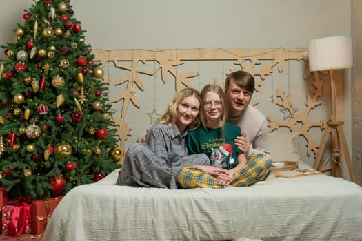 happy gift fun holiday man love new celebration bed year girl couple tenderness family positive
