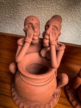 clay sculptures showcasing cultural artistry and expression. The intricate details highlight craftsmanship and creativity, providing a unique perspective on cultural art good for multimedia content creation