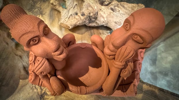 clay sculptures showcasing cultural artistry and expression. The intricate details highlight craftsmanship and creativity, providing a unique perspective on cultural art good for multimedia content creation