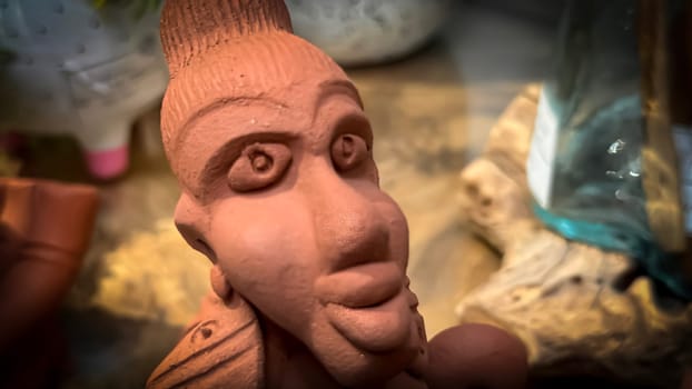 clay sculptures showcasing cultural artistry and expression. The intricate details highlight craftsmanship and creativity, providing a unique perspective on cultural art good for multimedia content creation