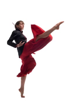 Woman wearing traditional chinese clothes practicing wushu isolated full-length shot on white background