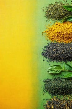 Different varieties of tea and turmeric powder forming a vibrant arrangement on a split yellow and green background