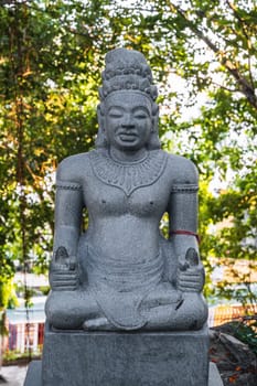 Buddhist statue of the deity in the park at pagoda at the Cham Towers in Nha Trang in Vietnam