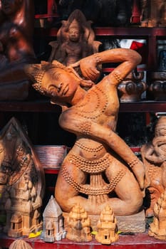 Clay figurines and statuettes in a Buddhist souvenir shop at a Po Nagar Cham Towers in Vietnam in Asia