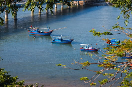 Vietnamese fishing boats on the Cai River in Nha Trang in Vietnam